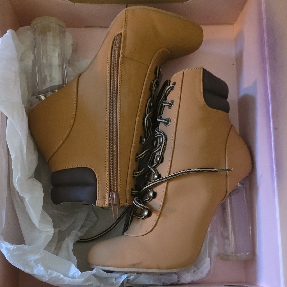 Stylish Charlotte Russe Heeled Boots with Clear Accents